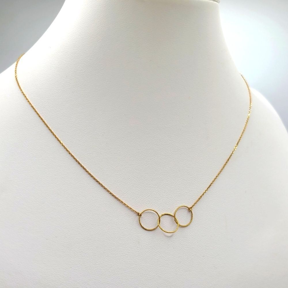 Gold over sterling necklace, 3 rings